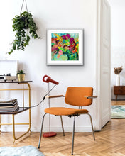 Load image into Gallery viewer, A mass of gorgeous blooms in shades of green, pink, magenta, red and gold in a green glass vase, framed in white.