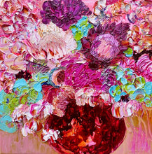 Load image into Gallery viewer, Pink flowers in varying shades in a red vase.
