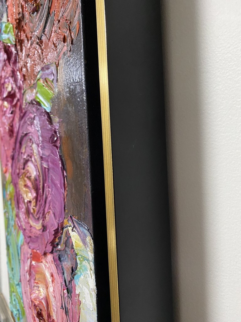 Velvet is an original painting by artist Kerry Bruce, oil on canvas, framed in black with gold trim, 34.5cm x 65cm. Cropped image showing gold trim.