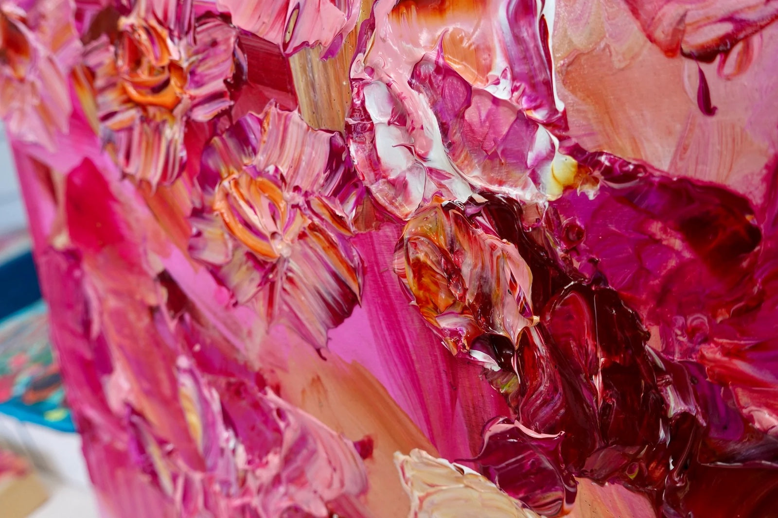 Pink flowers in varying shades from pale pink to hot pink.  Detail view.