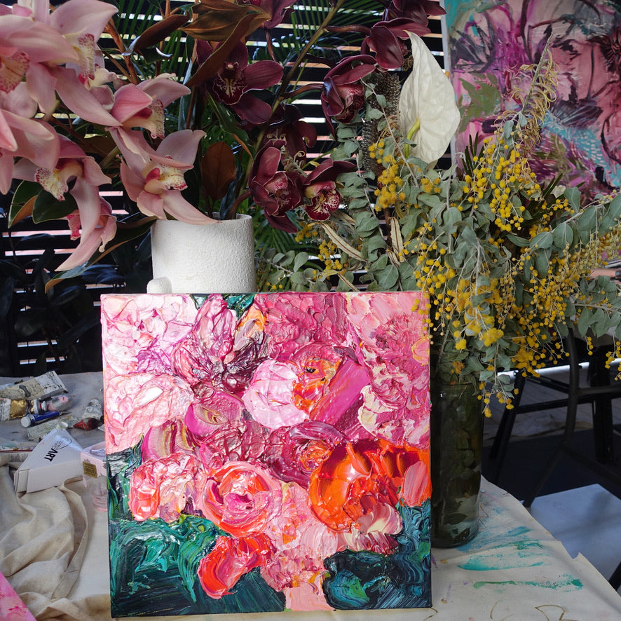 Paris is an original painting of a mass of hot pink, pale pink and orange flowers on a dark turquoise background by artist Kerry Bruce, acrylic on canvas, 39cm x 39cm.