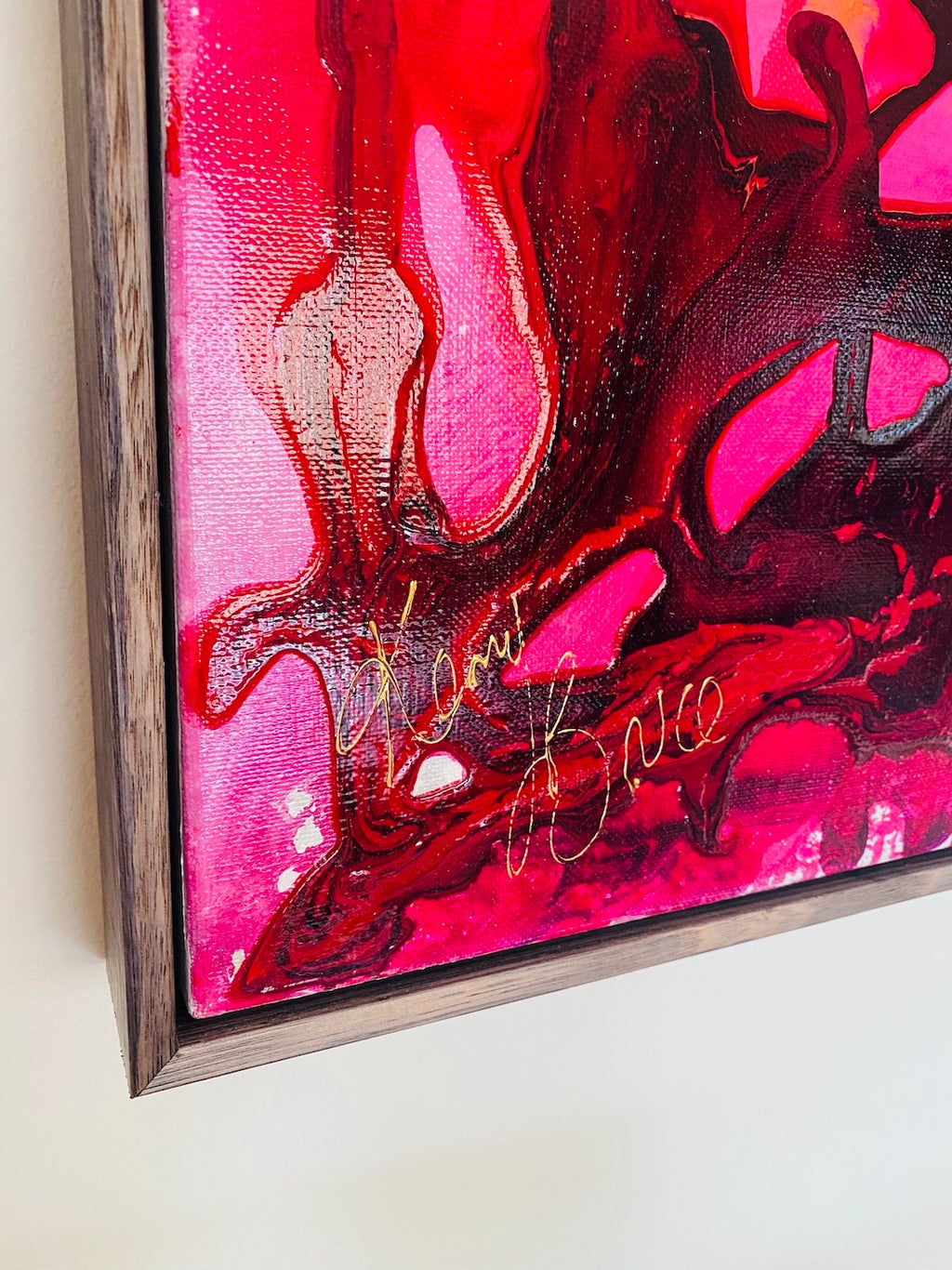 Buds & Blooms is a mass of red, orange and pink flowers in a black lacy vase, 100cm x 100cm Acrylic on Canvas.