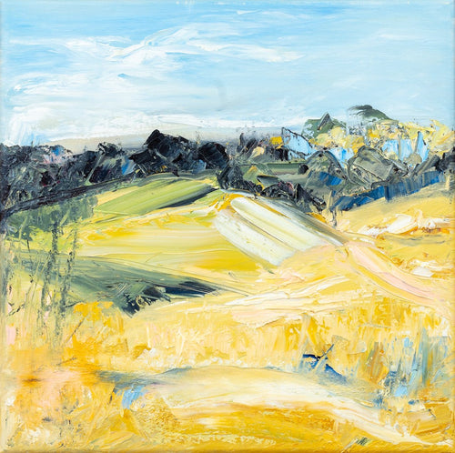 A limited edition print. of a yellow abstract country landscape with an aqua blue sky and charcoal rocks. 