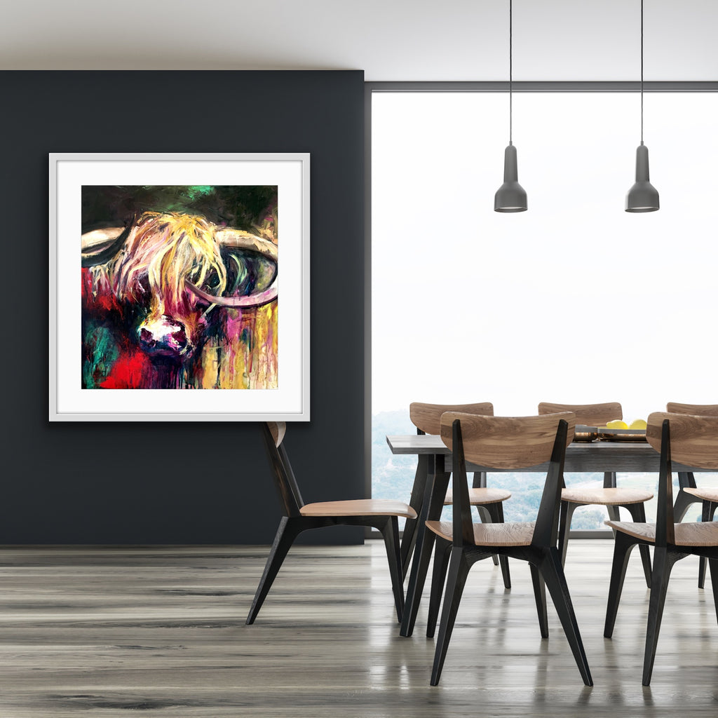 A lovely print of Curly the bull with his head against a background of emerald, red, gold, pink and black framed in white.