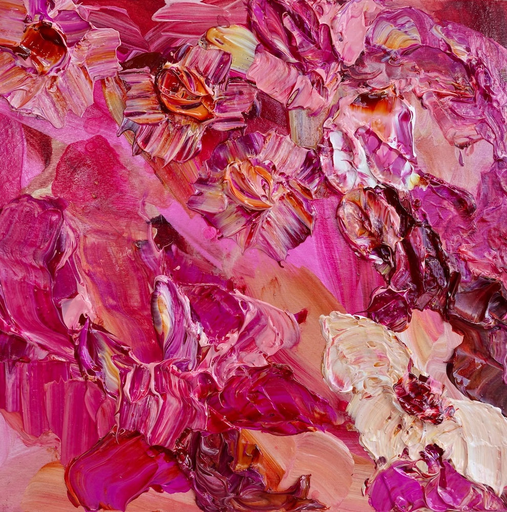 Pink flowers in varying shades from pale pink to hot pink. 
