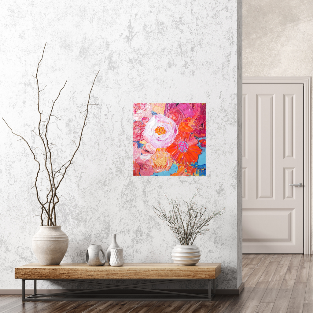 Petal is an original painting of a mass of pale pink, hot pink, orange and soft yellow flowers on a light blue background. Acrylic on canvas, 39cm x 39cm. Shown in situ against a marbled white wall.