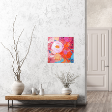 Load image into Gallery viewer, Petal is an original painting of a mass of pale pink, hot pink, orange and soft yellow flowers on a light blue background. Acrylic on canvas, 39cm x 39cm. Shown in situ against a marbled white wall.
