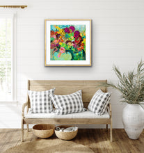 Load image into Gallery viewer, A mass of gorgeous blooms in shades of green, pink, magenta, red and gold in a green glass vase, framed in Tasmanian Oak.
