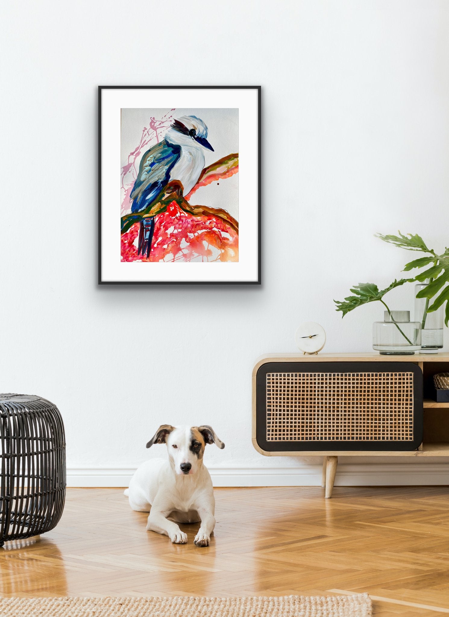 Kelsey Kookaburra is an original painting of a kookaburra, acrylic on 500gsm archival art paper. Shown in situ against a white wall above a timber sideboard.