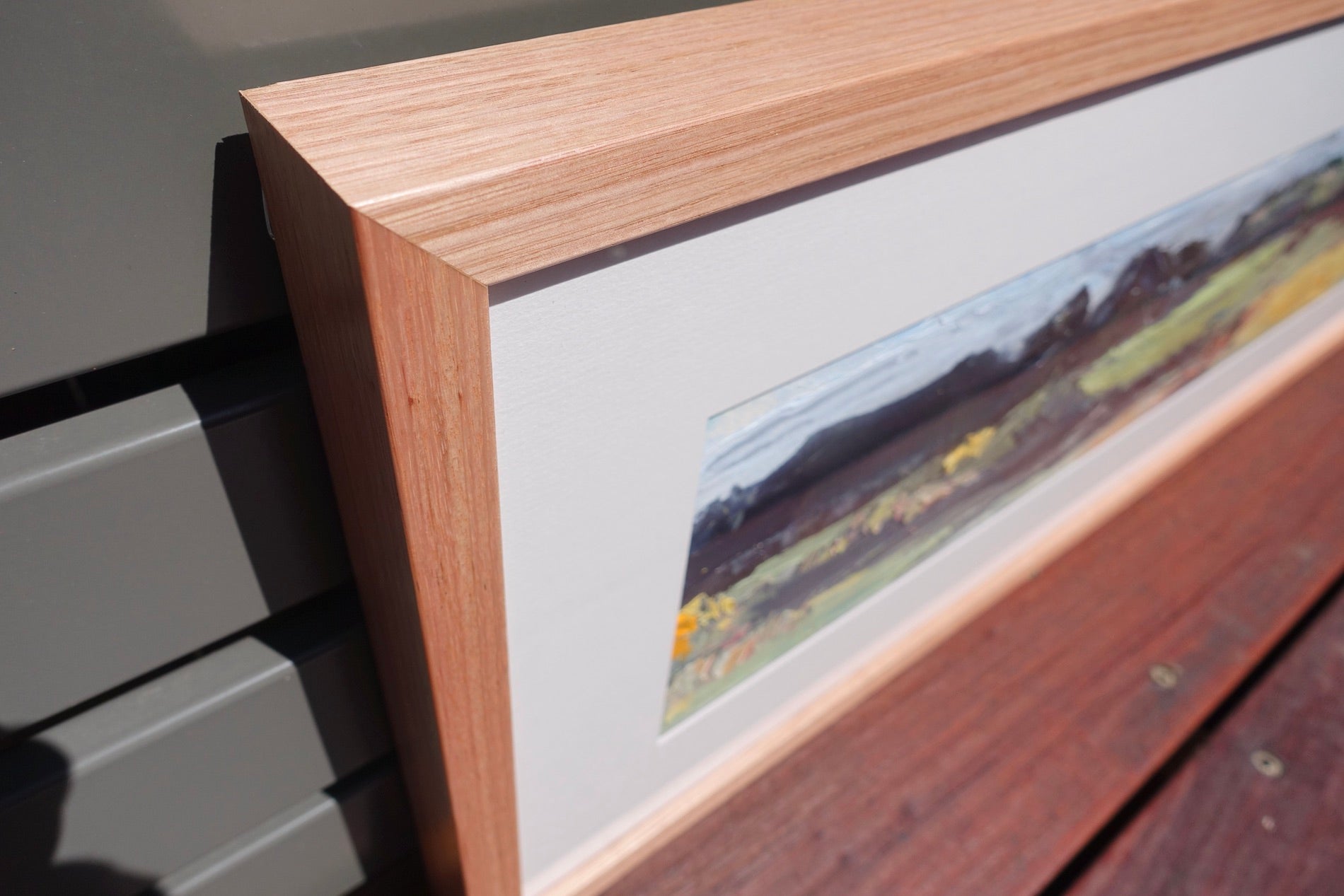 Hills and countryside around Kandos in country NSW, painted in an abstract style. close-up of frame.
