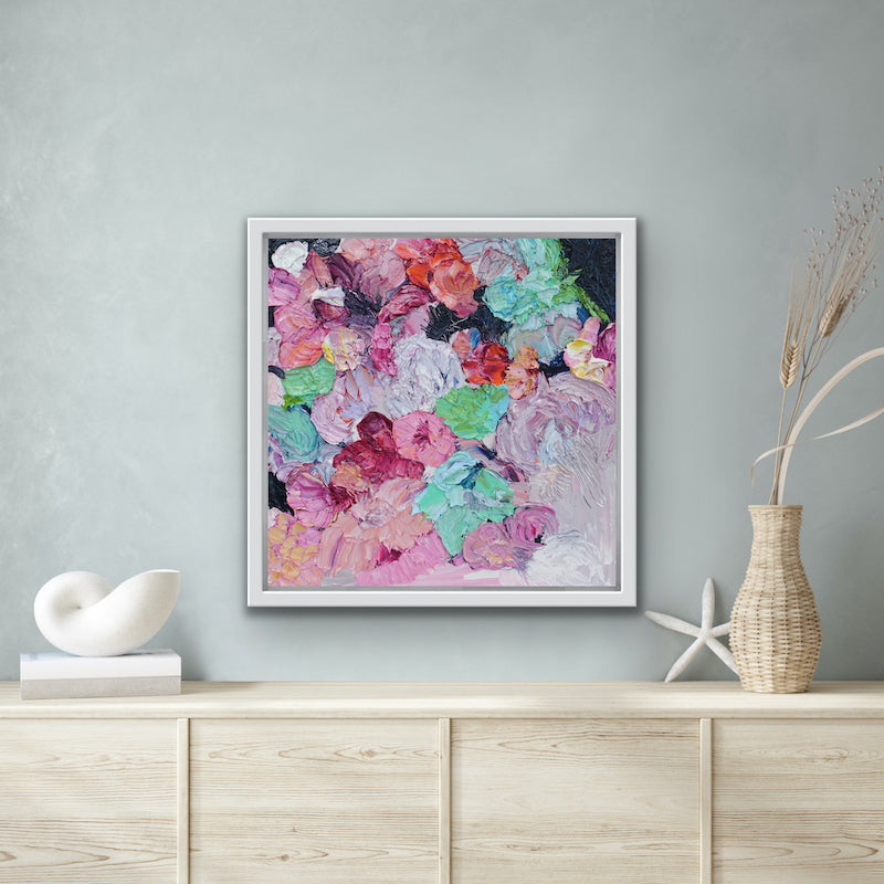 Original painting of a bouquet of pastel coloured blooms, just like a lollipop, shown on a pale grey wall.
