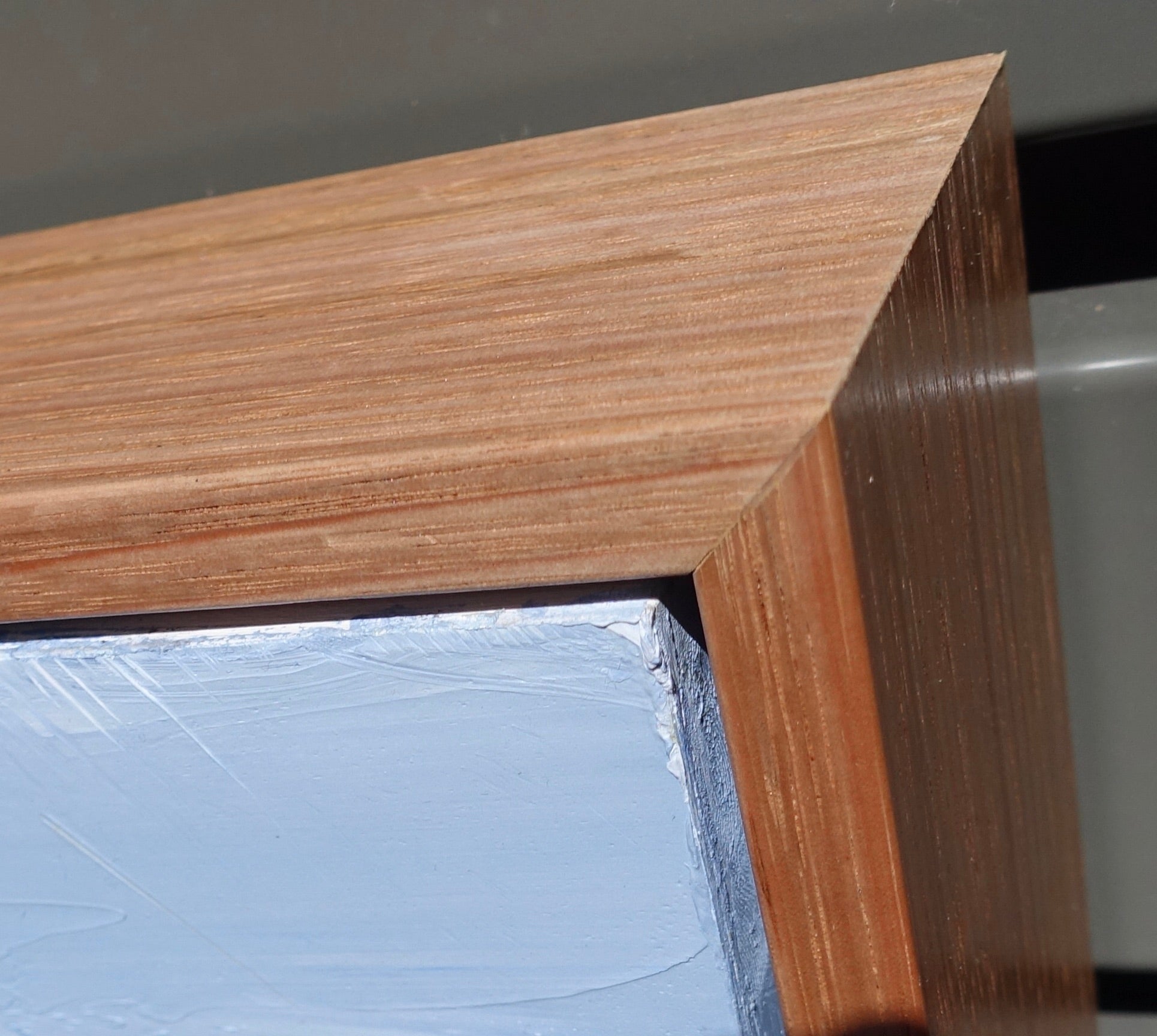 Abstract landscape with flashes of yellow in the countryside and blue mountains and blue sky. Close-up of frame.