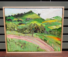 Load image into Gallery viewer, Abstract landscape of rolling green and yellow hills and a winding pink road. Framed view.
